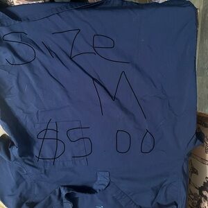 Assorted scrub tops and bottoms